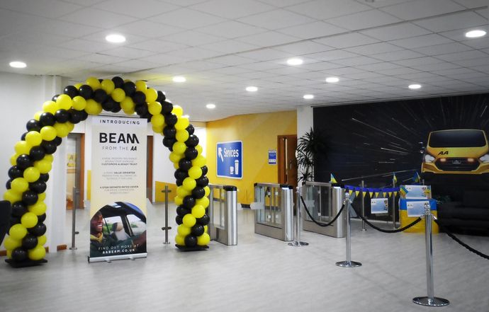 corporate balloon arch, balloon design, gateshead, north east, newastle, tyneside, balloon wall, event decor, balloon backdrop, corporate event decor, corporate launch decoration, new office opening balloon arch, yellow and black balloons, spiral balloon arch