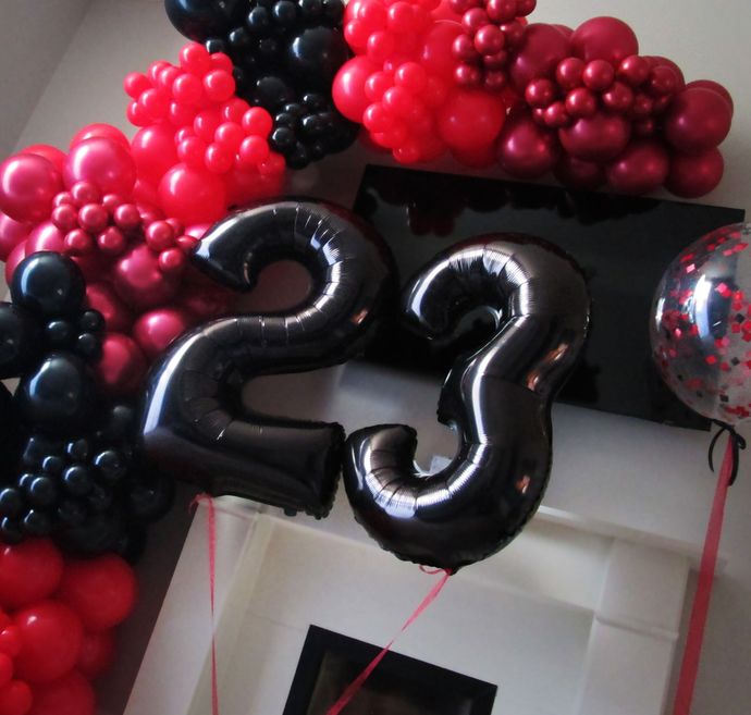 birthday balloon demi arch, balloon design, gateshead, north east, newastle, tyneside, balloon wall, event decor, balloon backdrop, birthday party balloon decoration, balloon arch, red and black balloons, balloon demi arch, balloon birthday numbers, organic balloon arch, colour block balloon arch