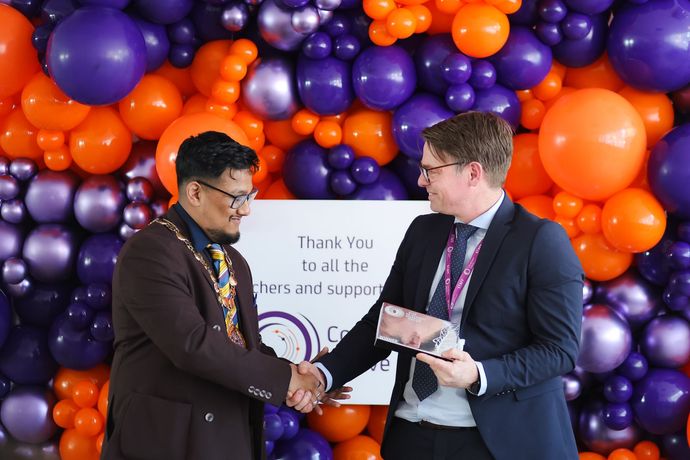 corporate balloon backdrop, balloon design, gateshead, north east, newastle, tyneside, balloon wall, event decor, purple and orange balloons, corporate opening, office party, organic balloons