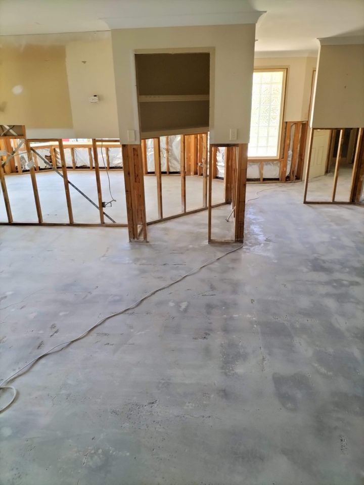 A Large Empty Room With a Concrete Floor and Demolished Wooden Walls — Goat Collective in Tintenbar, NSW