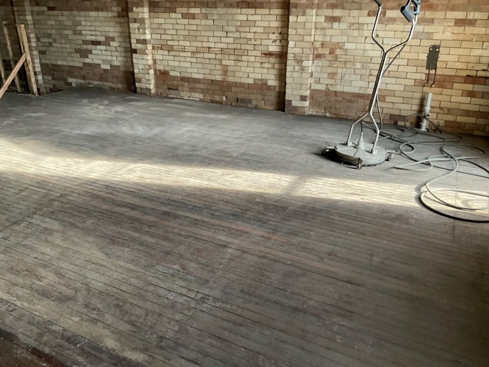 A Room With a Brick Wall and a Wooden Floor — Goat Collective in Tintenbar, NSW