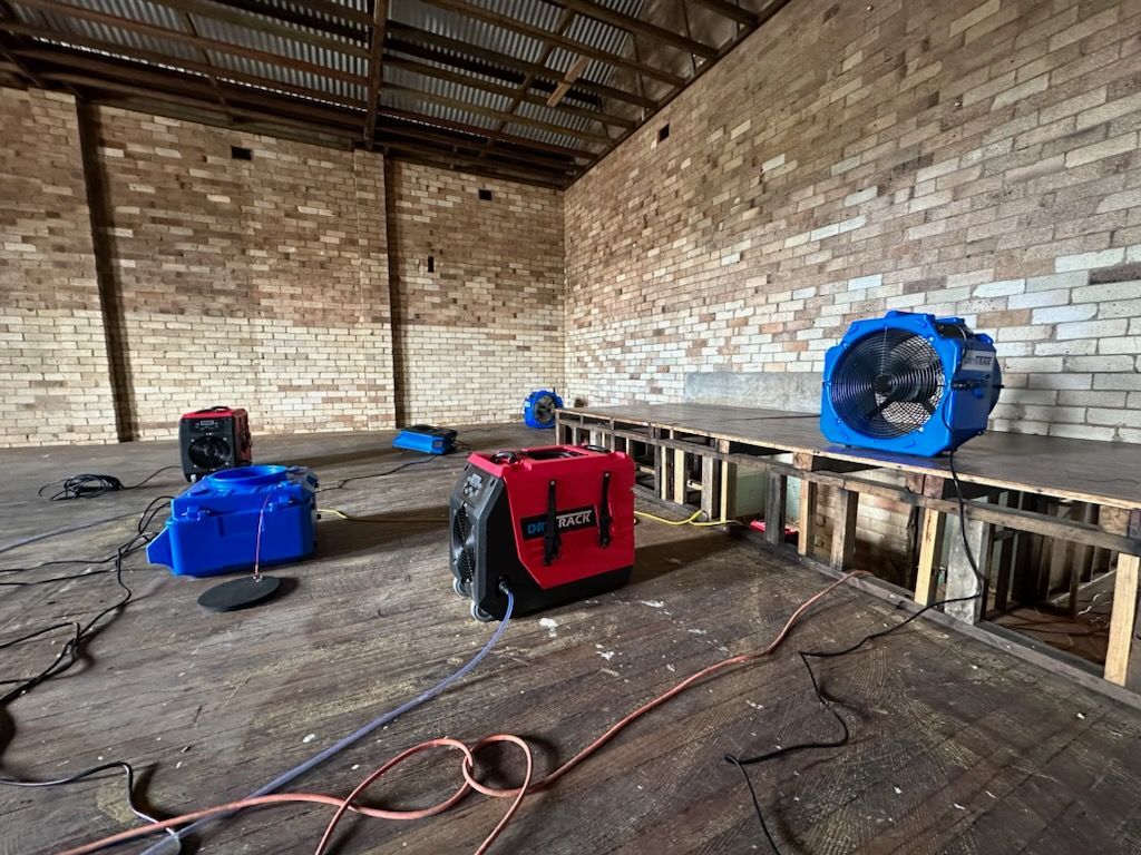 A Room With a Brick Wall and a Bunch of Fans on the Floor — Goat Collective in Tintenbar, NSW