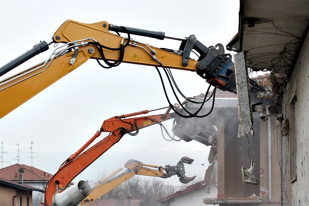 Demolition Excavators Tearing Down a Building's Facade — Goat Collective in Gold Coast, QLD
