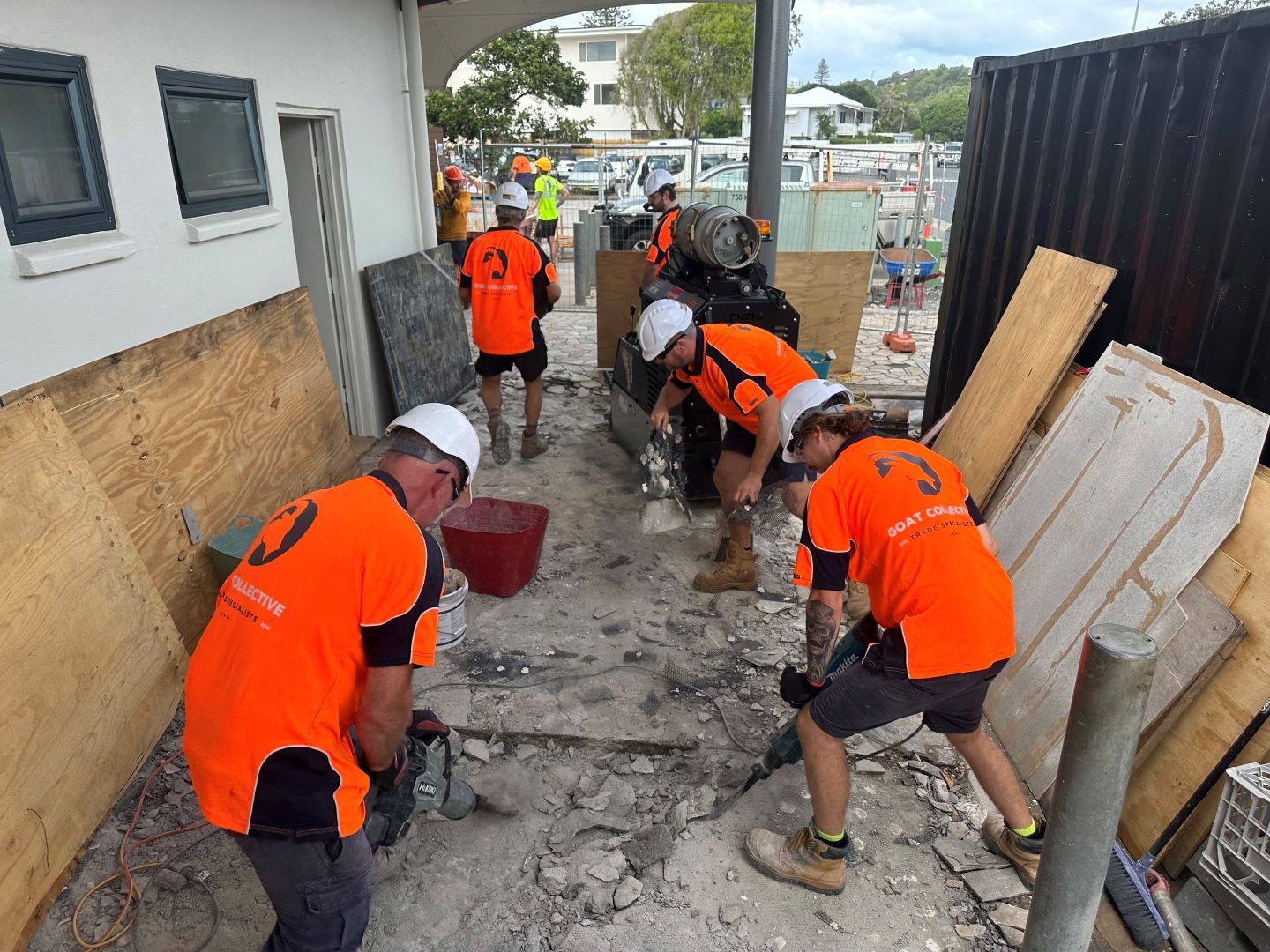 Two Electricians Are Working on the Ceiling of a Building — Goat Collective in Tintenbar, NSW
