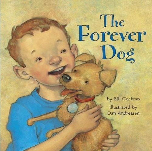Boy holding a dog, both smiling. The book cover reads 
