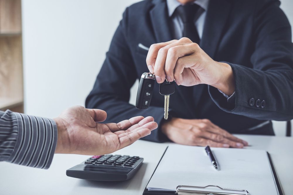 Car Keys Being Handed Over — Albury Super Cheap Car Rentals in Lavington, NSW