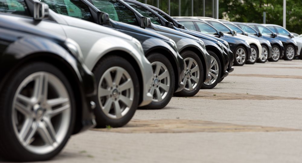Cars Parked in a Line on a Paved Lot; Varying Colors — Albury Super Cheap Car Rentals in Lavington, NSW