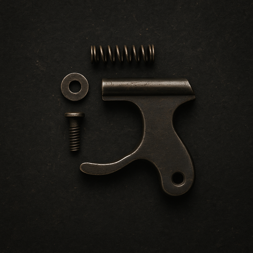 Disassembled firearm parts: a trigger, spring, screw, and washer, on a black background.