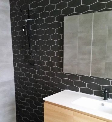 black tile bathroom