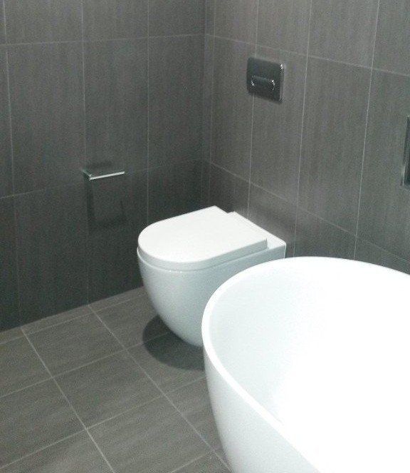 black tile bathroom