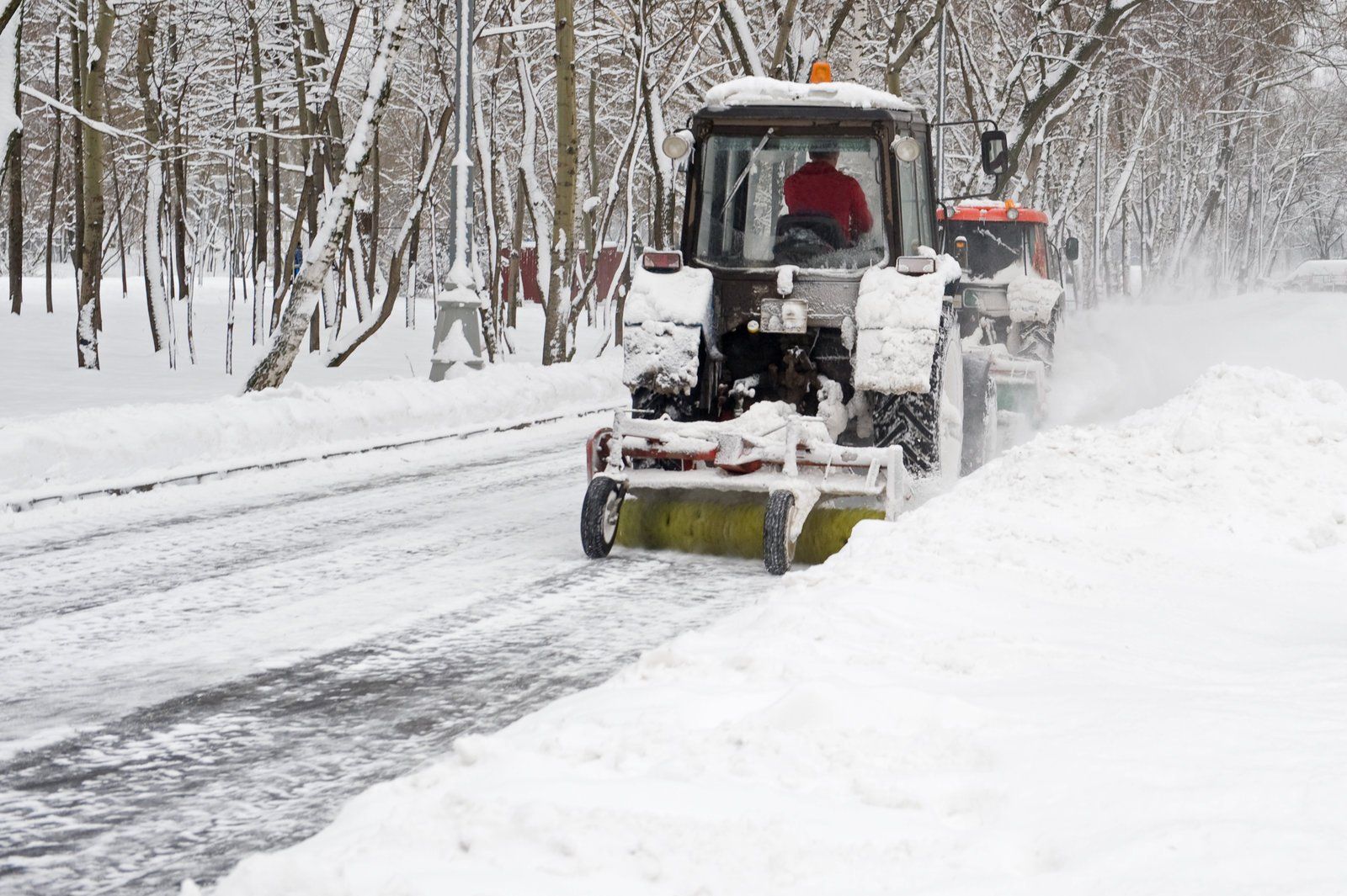 man driving the snow remover