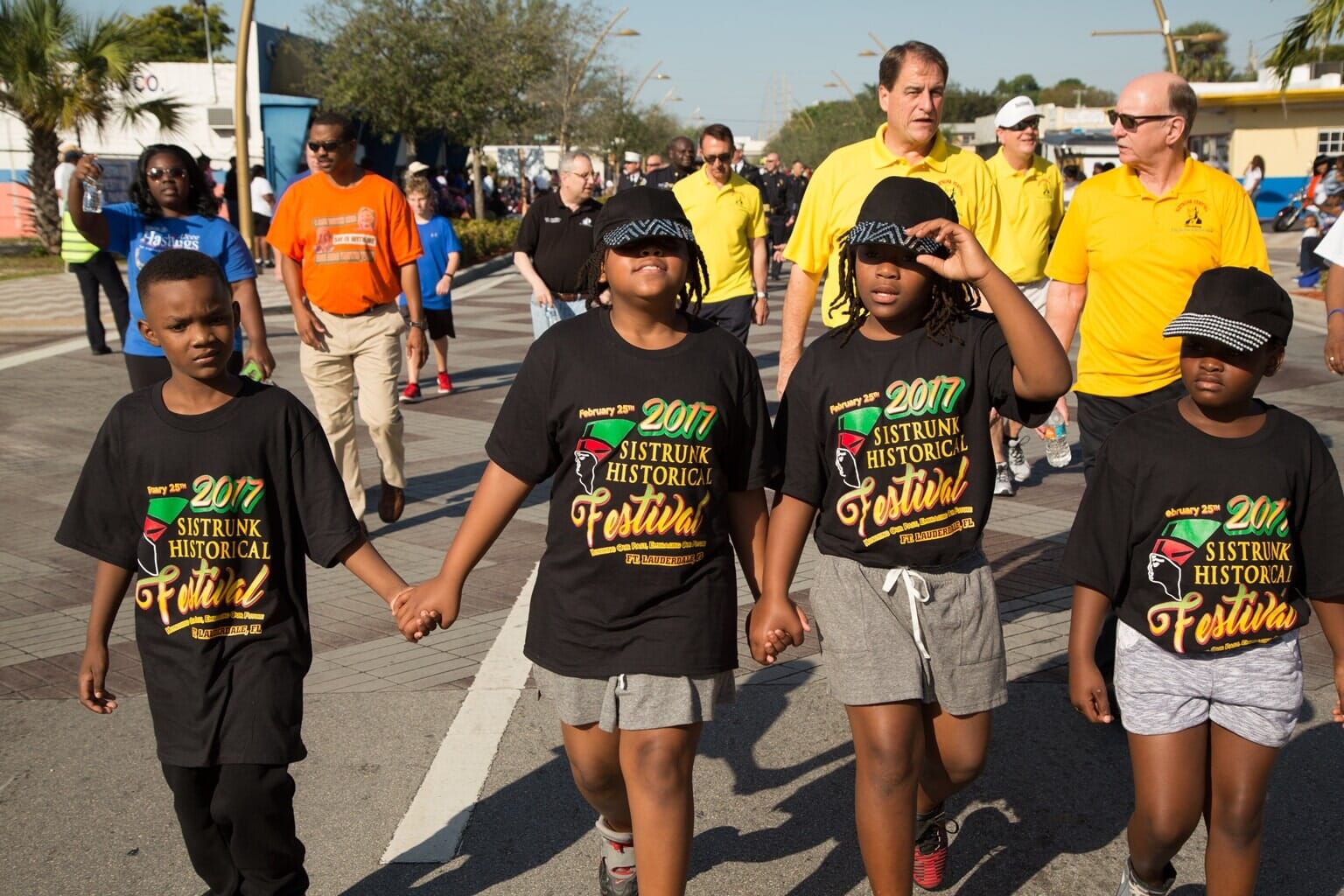 People holding hands — Festival in Fort Lauderdale, FL