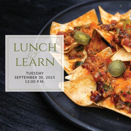 a plate of sandwiches on a table with the words lunch & learn on it