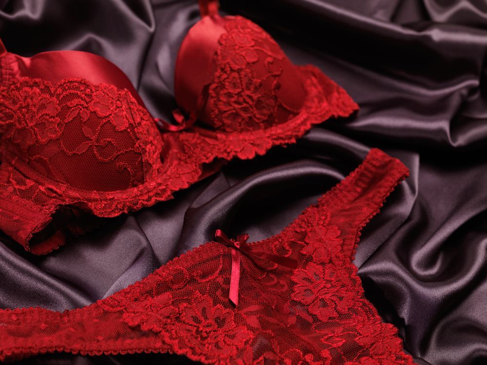 Red lace Lingerie Set on Dark, Satiny Fabric — Shona's Lingerie in Hermit Park, QLD