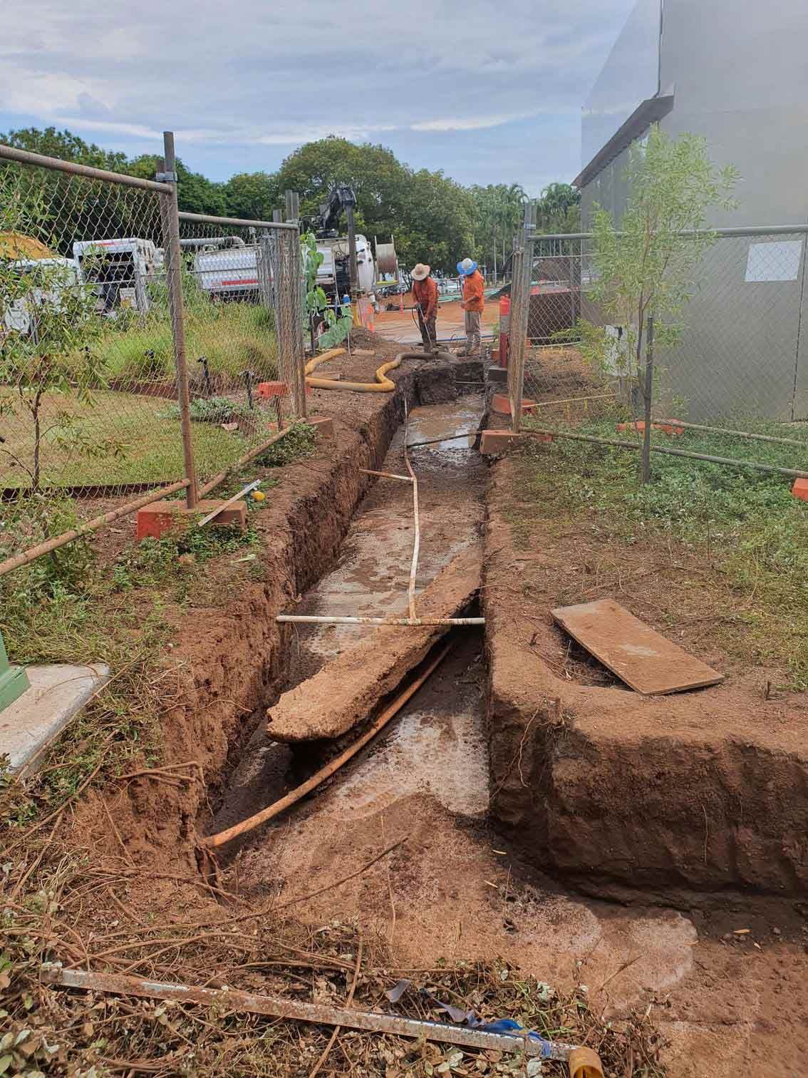 Workers Laying Pipes — Austar Underground Services in Girraween, NT