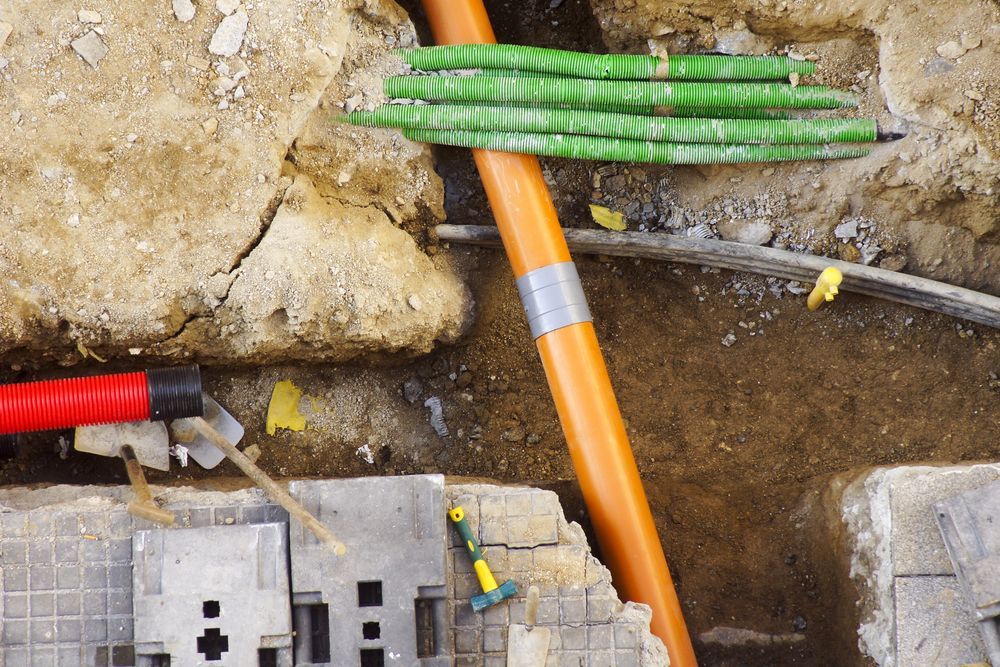 Workers Repairing Water, Fibre and KG Sewer — Austar Underground Services in Darwin, NT