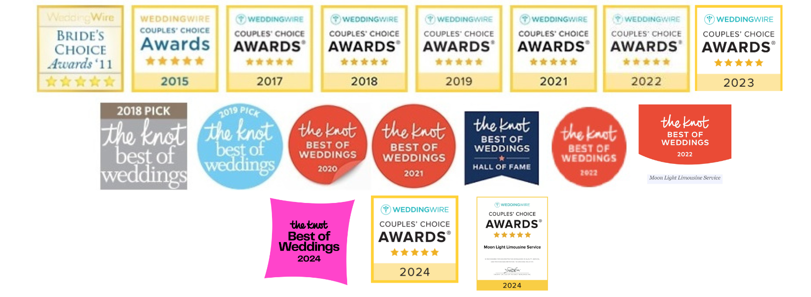 A bunch of awards are lined up on a white background.
