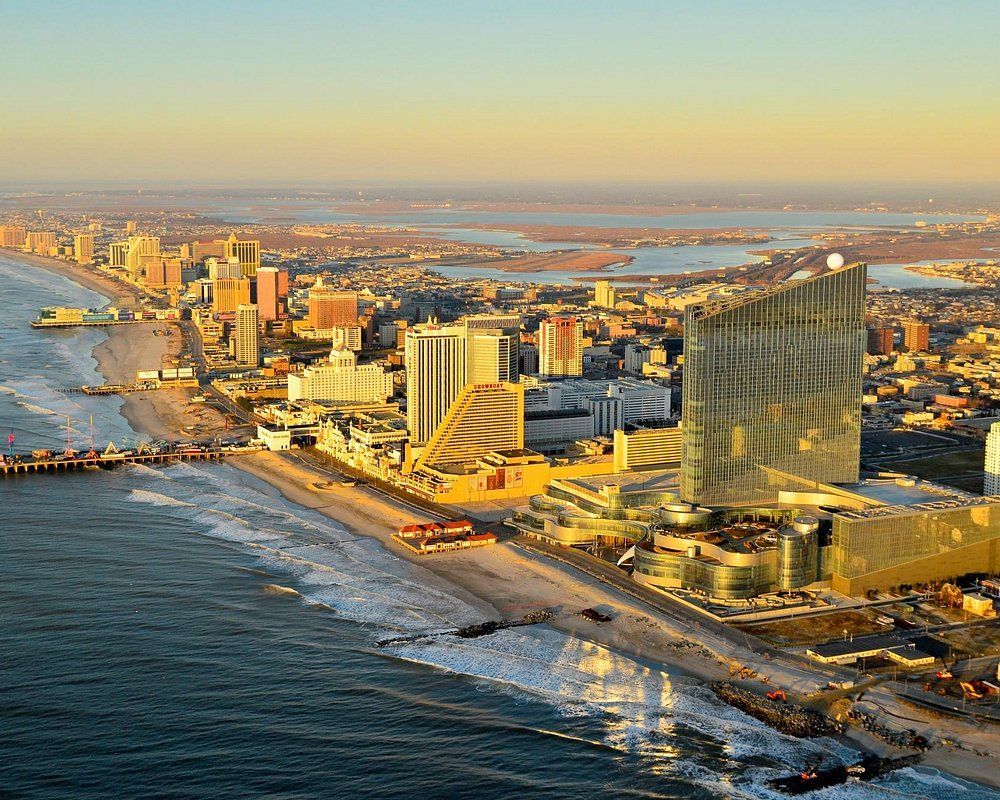 An aerial view of a city next to a body of water