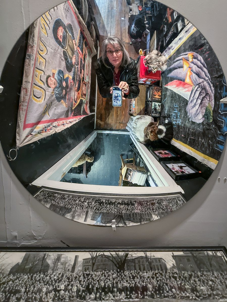 self reflection in mirror in hallway