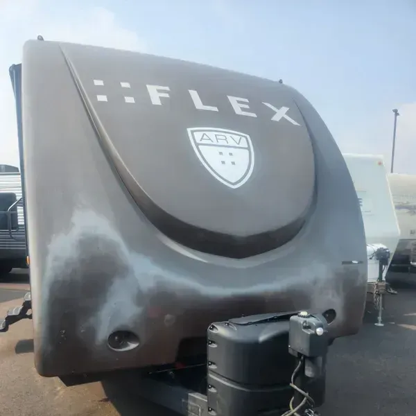 A flex rv is parked in a parking lot