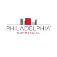 Philadelphia Commercial logo with building graphic in red, gray, and white.