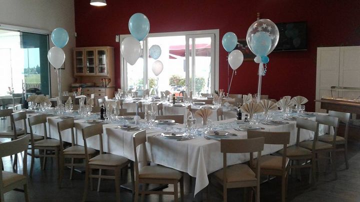 Table with balloons and christening decorations