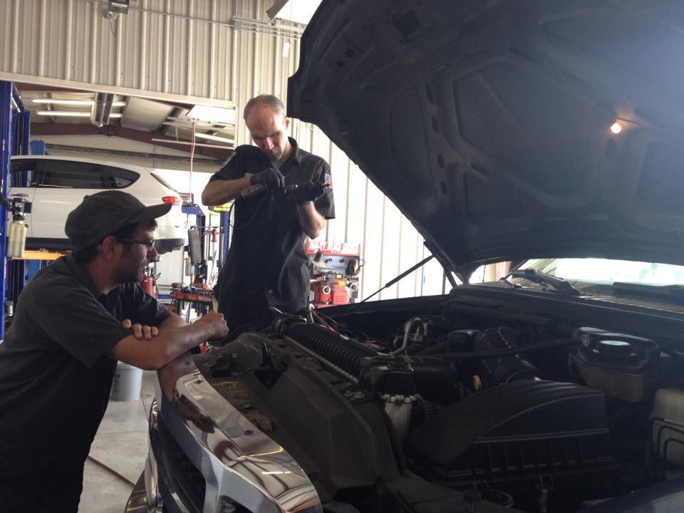 Mechanics Work on a Car | State Automotive