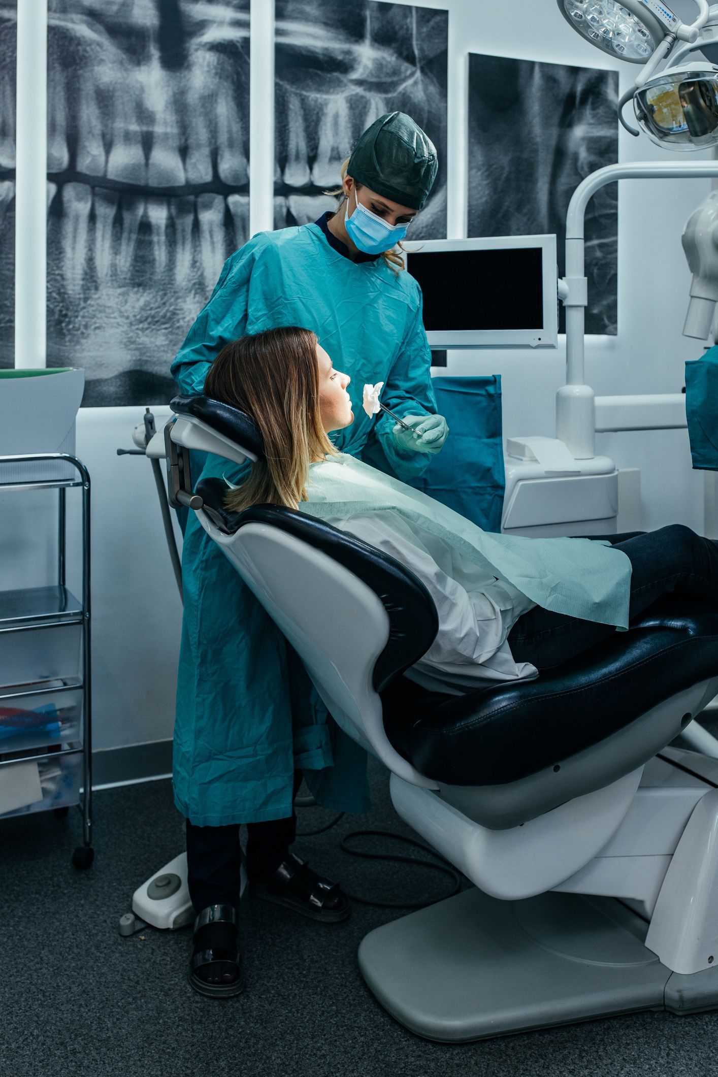 A skilled emergency dentist from Silver Lake Family Dental is performing a procedure on a patient