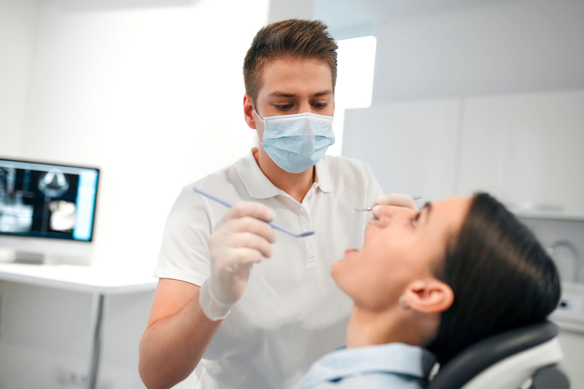Detailed dental consultation at a dentist's office