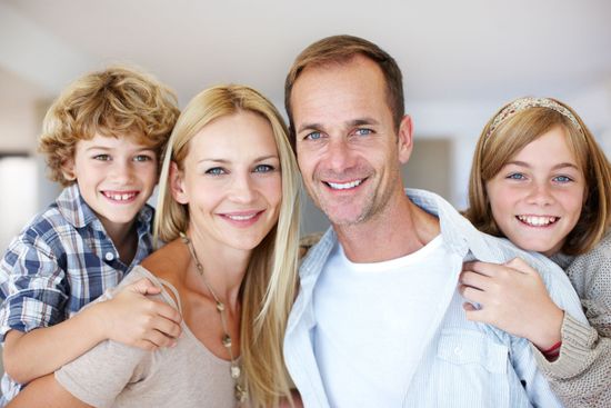 A family who receives general dentist services in Orland Park, IL