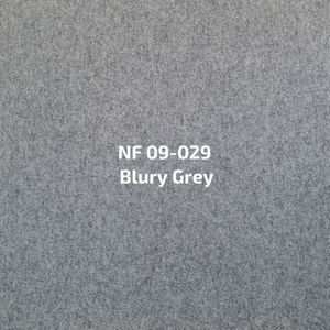 Een close-up van een grijs tapijt met de woorden 'wazig grijs' erop geschreven.