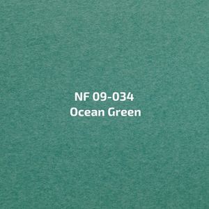 Een close-up van een vel papier met de tekst oceaangroen