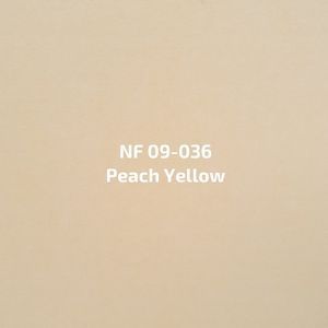 Een close-up van een perzikgele verfkleur.