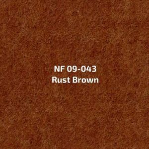 Een close-up van een stuk roestbruine stof.