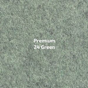 Een close-up van een stuk premium 24 groen tapijt.