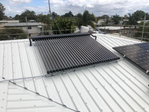 Solar Thermal Water Heater on a Corrugated Metal Roof — Hales Plumbing & Roofing In The Range, QLD