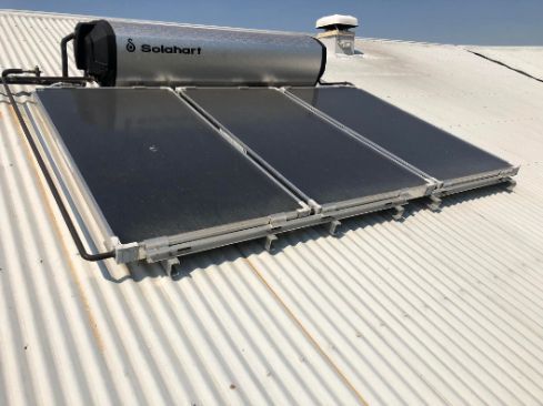 Solar Water Heater on a Corrugated Metal Roof — Hales Plumbing & Roofing In The Range, QLD