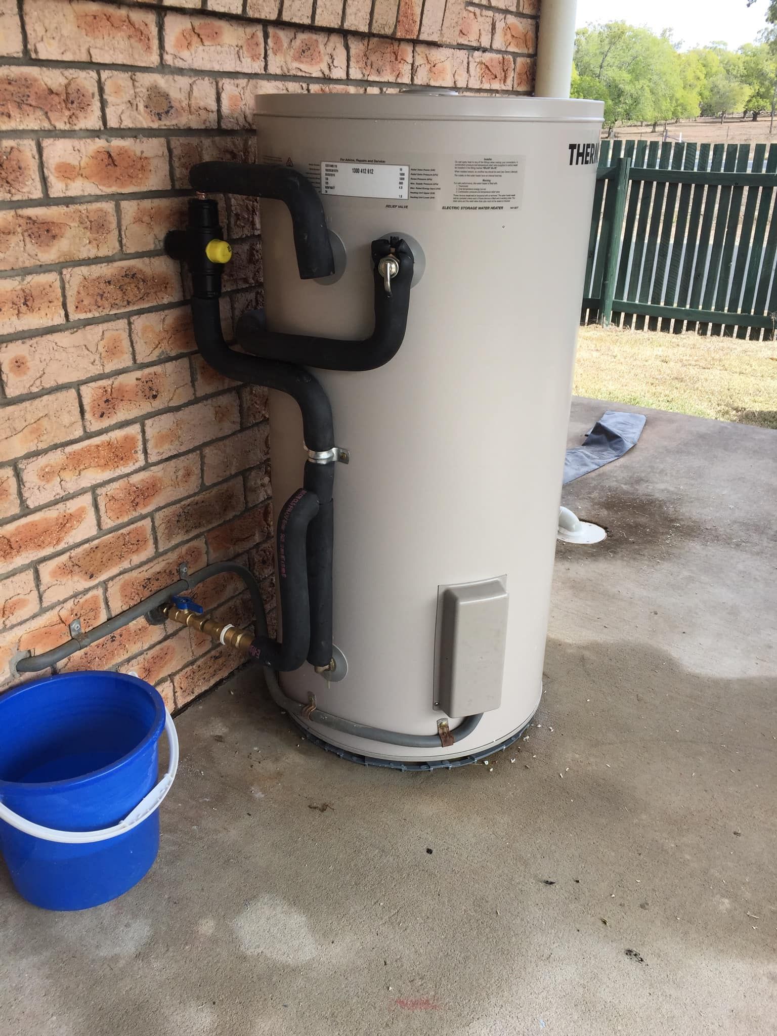 White Wall-mounted Gas Boiler — Hales Plumbing & Roofing In The Range, QLD