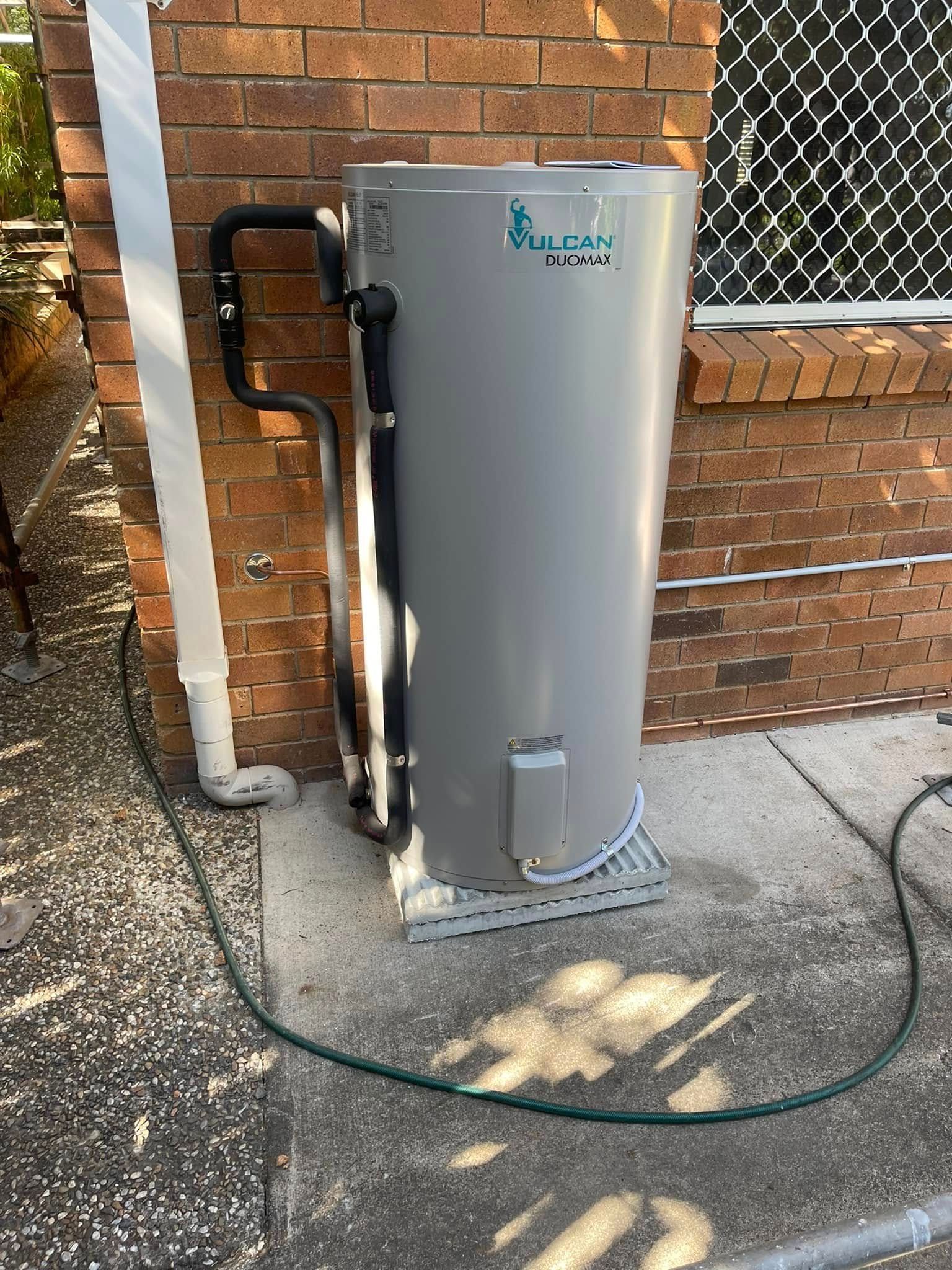 Plumbing Pipes With a Large Clog of Hair and Debris — Hales Plumbing & Roofing In Yeppoon, QLD