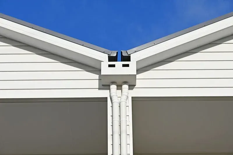 A Close Up Of A Roof With A Chimney In The Background — Roof Flashings in Toowoomba, QLD