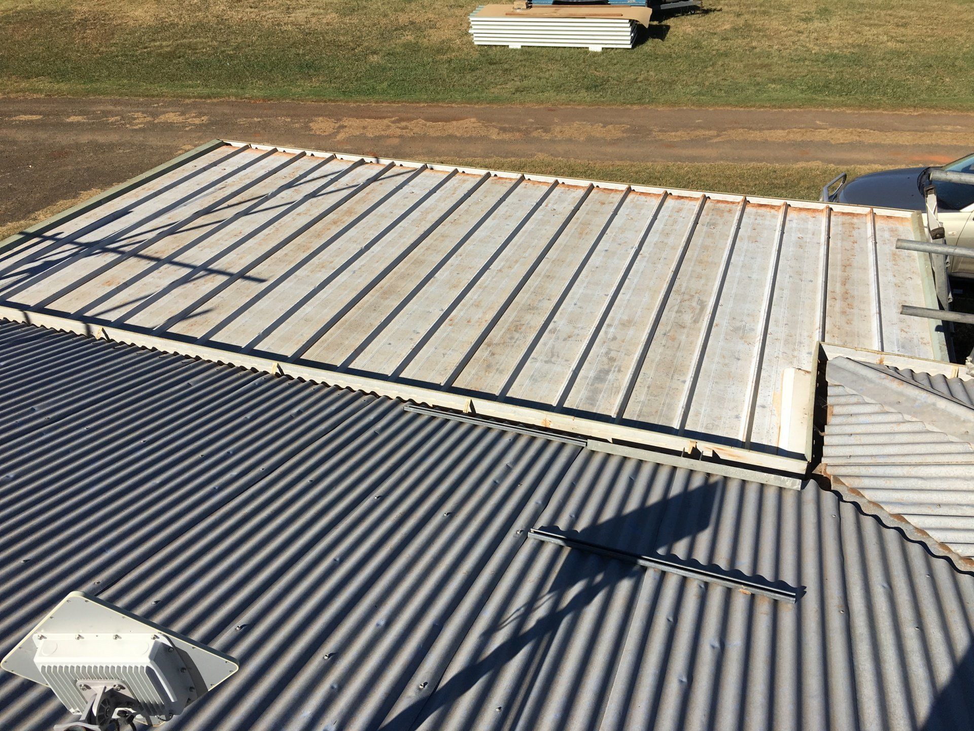 Insulated metal re-roof roof replacement