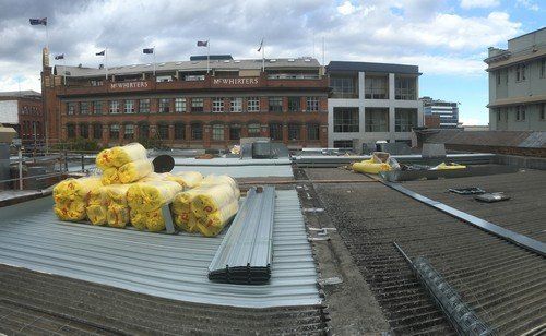 Commercial re-roof Brisbane City Zincalume Kilplok