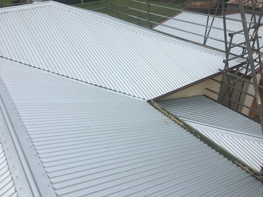Re-roof old painted installed new Zincalume corro