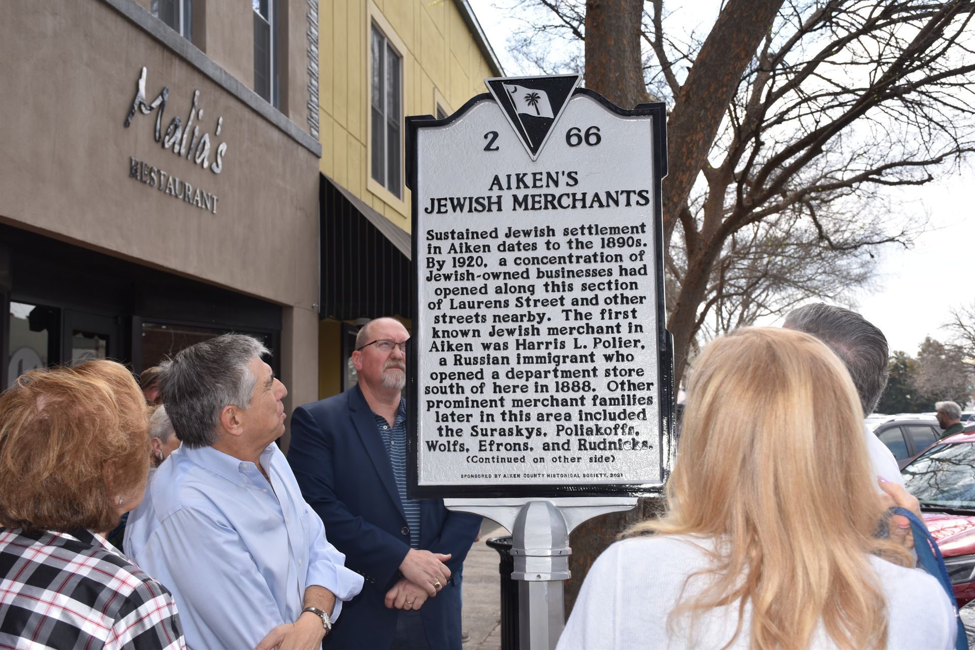 Sign celebrating the history of Aiken's Jewish Merchants
