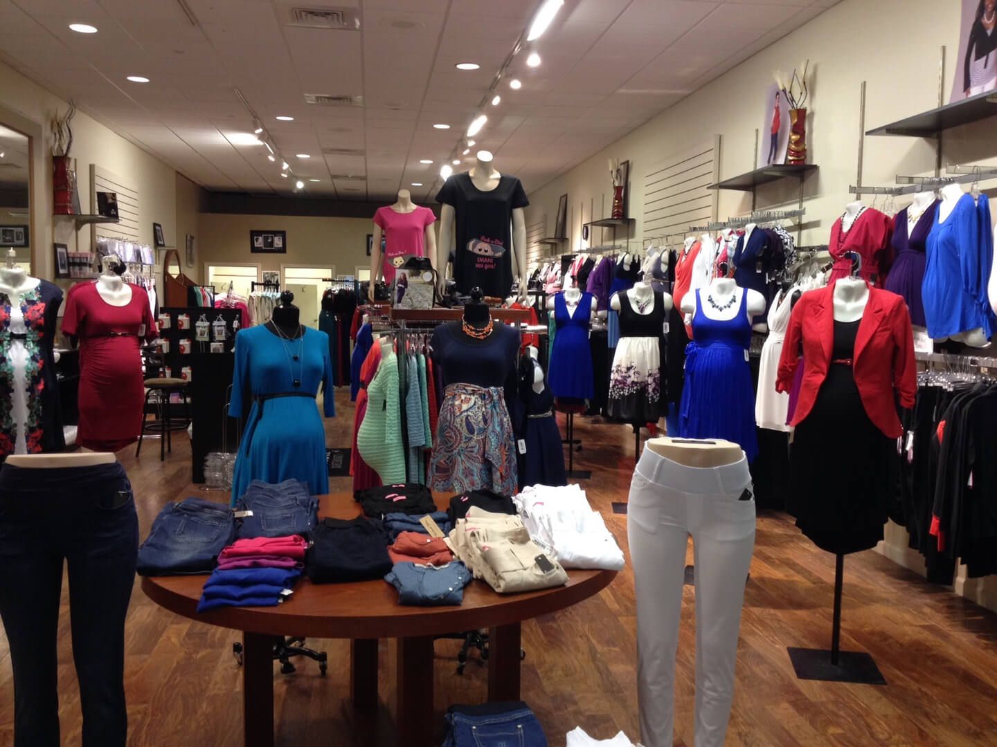 A store filled with lots of clothes and mannequins