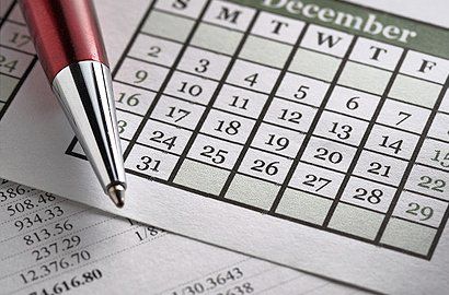 Calendar with a red pen