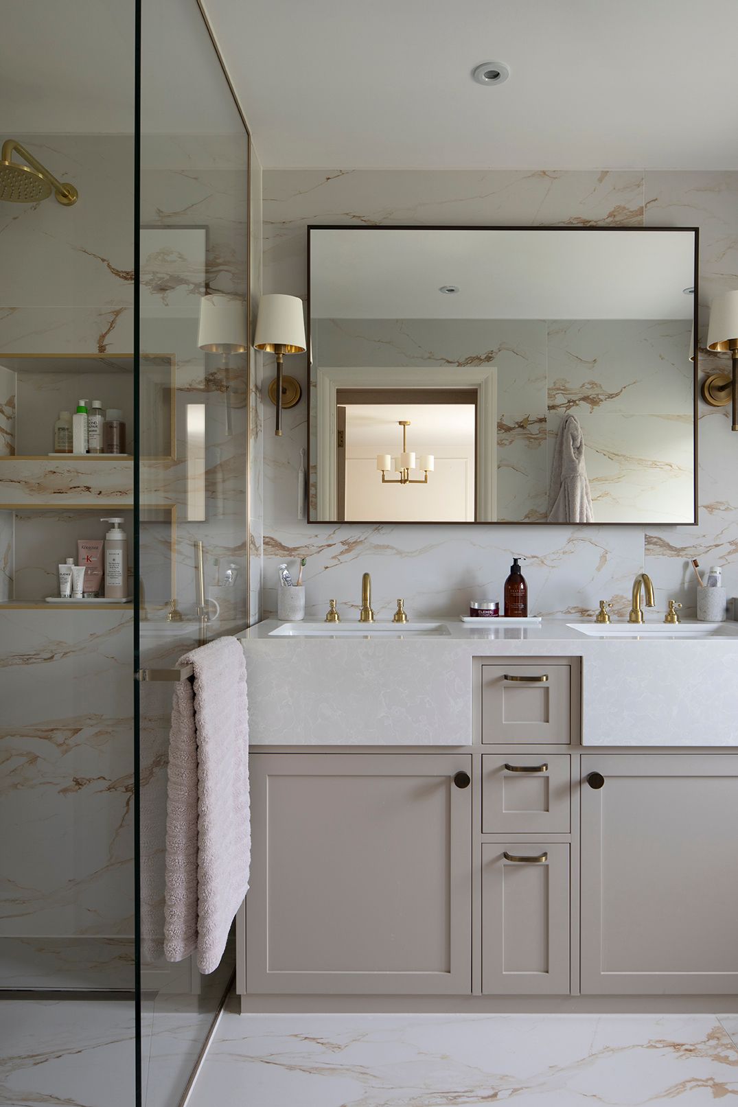 Double vanity with shaker-style cabinetry, black-framed mirror, and glass shower screen in Hertford ensuite by Elisa Design