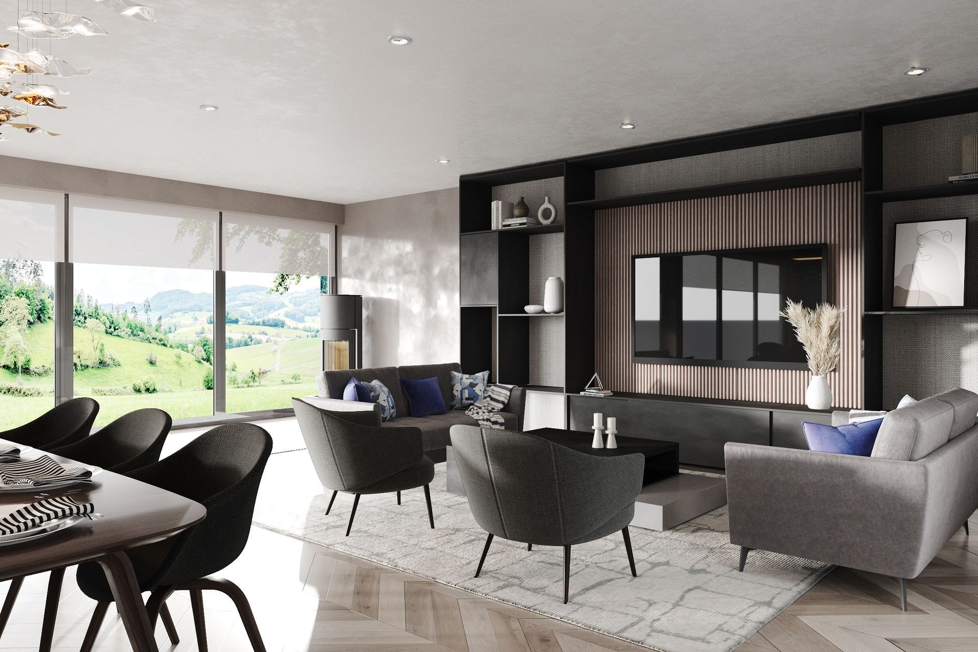 Open‑plan living area with grey sofa, armchairs and bespoke media wall, overlooking garden views through full‑height glazing