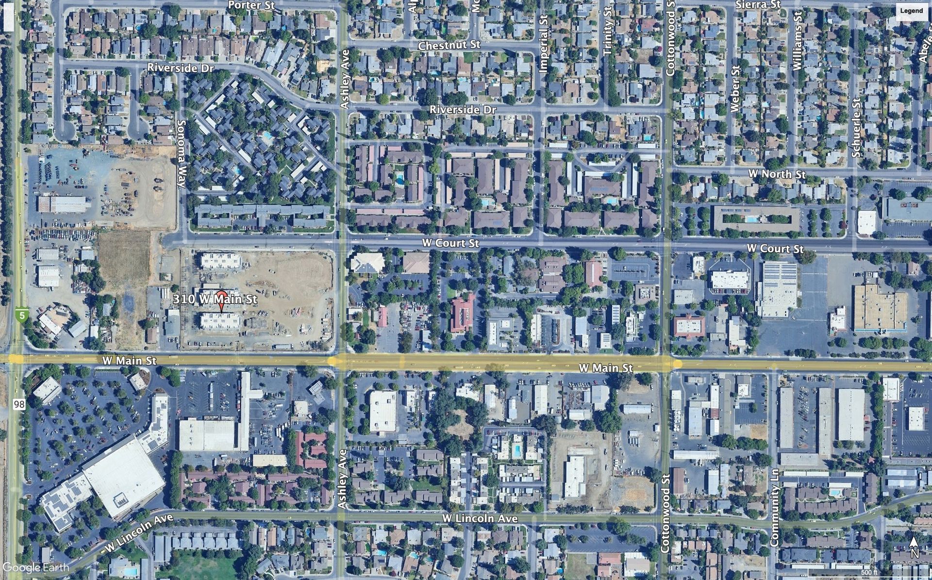 An aerial view of a residential area with lots of buildings