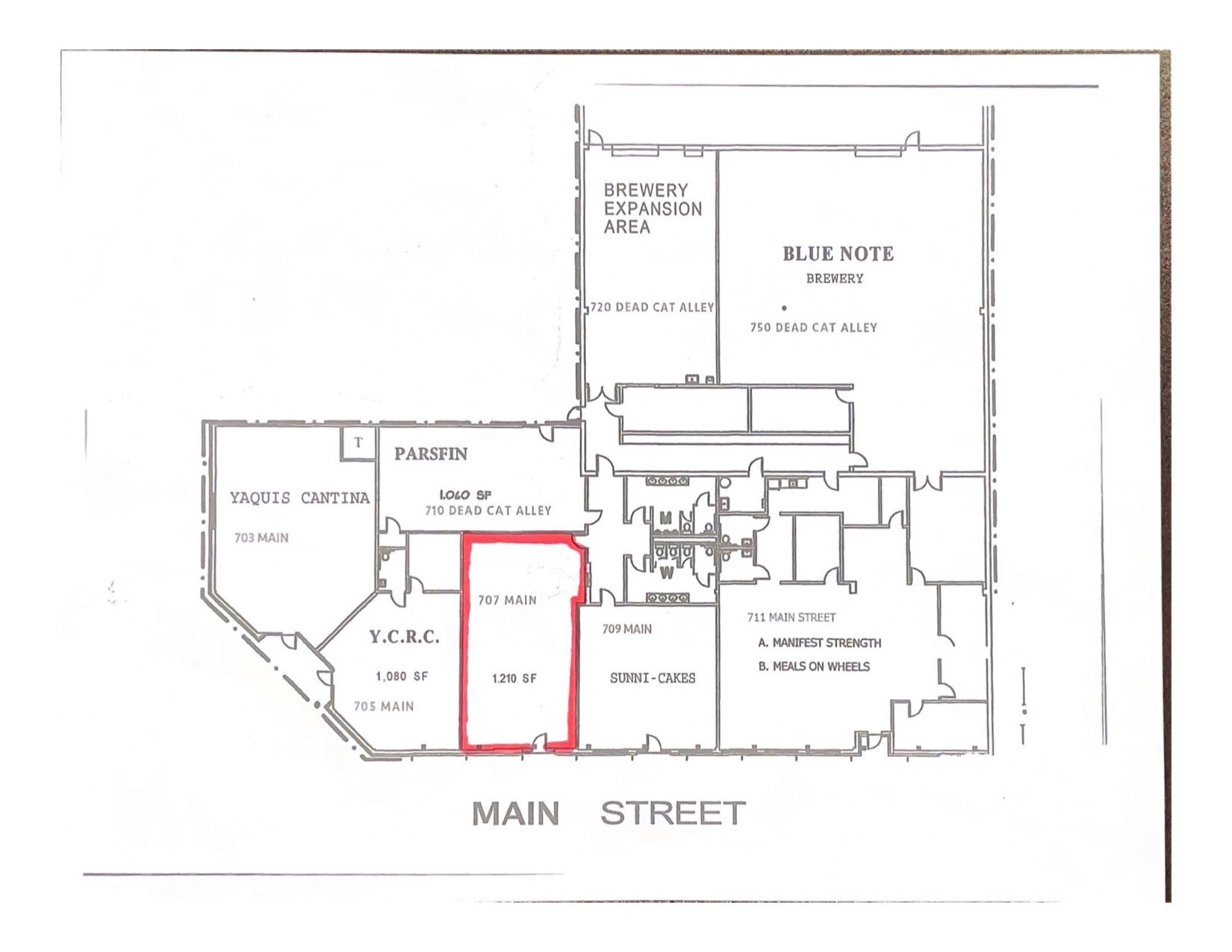 A black and white floor plan of a building on main street